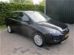 Ford Focus Wagon - 1.6 TDCi Titanium EURO 4 2e eigenaar - 1 - Thumbnail