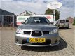 Subaru Impreza Plus - 2.0R Airco zeer nette auto met weinig KM - 1 - Thumbnail