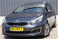 Kia Cee'd - 1.6 GDI DYNAMICLINE NAVI/ CLIMA/ CRUISE/ LMV RIJKLAAR - 1 - Thumbnail