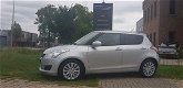 Suzuki Swift - 1.2 Exclusive | Nederlandse auto | 1e eigenaar - 1 - Thumbnail