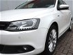 Volkswagen Jetta - 1.4 TSI Aut7 Hybrid Highline (leer, panodak, xenon) - 1 - Thumbnail