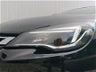 Opel Astra Sports Tourer - 1.0T 105PK Online Edition | Navi | PDC Voor+Achter | Camera | All Season - 1 - Thumbnail
