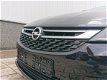 Opel Astra Sports Tourer - 1.0T 105PK Online Edition | Navi | PDC Voor+Achter | Camera | All Season - 1 - Thumbnail