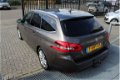 Peugeot 308 SW - 1.2 e-THP Blue Lease Executive Navigatie/Panoramadak/Climate controle/Cruise contro - 1 - Thumbnail