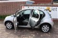 Nissan Micra - 1.2i 16V 80 pk Elle 5 deurs airco - 1 - Thumbnail