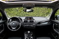 BMW 1-serie - 116i Sport Schuifdak LED Cruise Climate Stoelverwarming Open Dak Panoramadak Bluetooth - 1 - Thumbnail