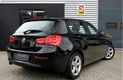 BMW 1-serie - 116i Sport Schuifdak LED Cruise Climate Stoelverwarming Open Dak Panoramadak Bluetooth - 1 - Thumbnail