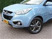 Hyundai ix35 - 1.6i GDI Business Edition 93.000km | Trekhaak | Navi | Leer | Led | Pdc - 1 - Thumbnail