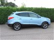 Hyundai ix35 - 1.6i GDI Business Edition 93.000km | Trekhaak | Navi | Leer | Led | Pdc - 1 - Thumbnail