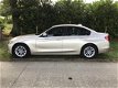 BMW 3-serie - 320i xDrive High Executive met lage kilometerstand, 1e eig./dealeronderhouden - 1 - Thumbnail