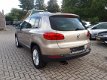 Volkswagen Tiguan - 1.4 TSI Sport&Style navi - 1 - Thumbnail