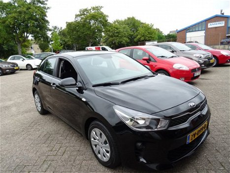 Kia Rio - 5drs 1.2 CVVT Comfort 1e Eig AIRCO/METALLIC/BLUETOOTH/ELEK - 1