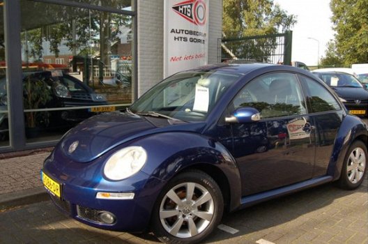 Volkswagen New Beetle - 1.4-16V Trendline - 1