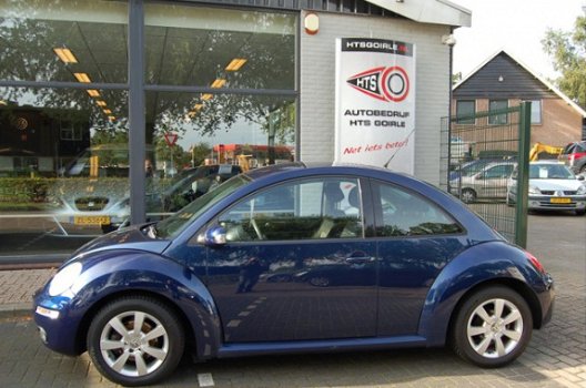 Volkswagen New Beetle - 1.4-16V Trendline - 1