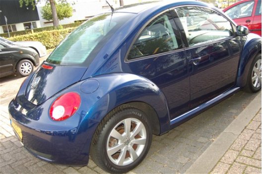 Volkswagen New Beetle - 1.4-16V Trendline - 1