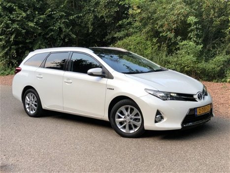 Toyota Auris Touring Sports - 1.8 Hybrid Lease Navi. / Clima / Cruise Cont. / Panorama Dak - 1