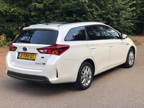 Toyota Auris Touring Sports - 1.8 Hybrid Lease Navi. / Clima / Cruise Cont. / Panorama Dak - 1