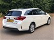 Toyota Auris Touring Sports - 1.8 Hybrid Lease Navi. / Clima / Cruise Cont. / Panorama Dak - 1 - Thumbnail