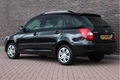 Skoda Fabia Combi - 1.2 TSi Sprint DSG | Climate control | Cruise control | Ruim | Zuinig | - 1 - Thumbnail