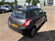 Suzuki Swift - 1.2 Comfort 4x4/ Airco/ PDC/ 5 Drs - 1 - Thumbnail