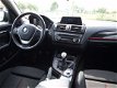 BMW 1-serie - 118i Business+ SPORT - 1 - Thumbnail