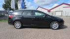 Ford Focus Wagon - 1.0 EcoBoost Titanium 125 pk, Navigatie, Park Pack, Winter Pack, Xenon, 72429 km - 1 - Thumbnail