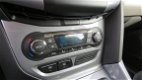 Ford Focus Wagon - 1.0 EcoBoost Titanium 125 pk, Navigatie, Park Pack, Winter Pack, Xenon, 72429 km - 1 - Thumbnail