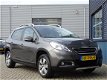 Peugeot 2008 - 1.2 PURETECH 82PK STYLE, NAVIGATIE, LICHTMETALEN VELGEN, CLIMATE - 1 - Thumbnail