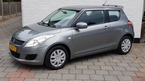 Suzuki Swift - 1.2 3drs comfort airco spioler in kleur 58000 km - 1