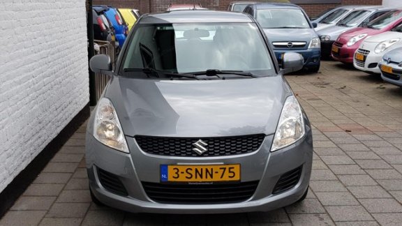 Suzuki Swift - 1.2 3drs comfort airco spioler in kleur 58000 km - 1