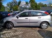 Ford Focus - 1.4-16v 5-deurs Ambiente CDV stuurbekr APKaug2020 - 1 - Thumbnail