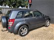 Suzuki Grand Vitara - 2.0-16V Exclusive // 4 NIEUWE BANDEN// AIRCO // - 1 - Thumbnail