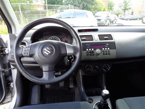 Suzuki Swift - 1.3 LIMITED GT-LINE 5 DEURS / AIRCO / LM VLG / RADIO-CD MP3 / C.VERGR.AFSTANDBEDIEND - 1