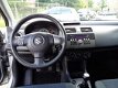 Suzuki Swift - 1.3 LIMITED GT-LINE 5 DEURS / AIRCO / LM VLG / RADIO-CD MP3 / C.VERGR.AFSTANDBEDIEND - 1 - Thumbnail