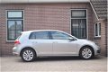 Volkswagen Golf - 1.0 TSI 115pk H6 Comfortline Ecc Pdc Navigatie 5drs - 1 - Thumbnail