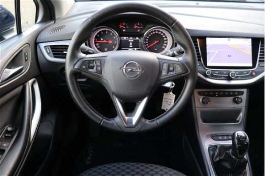 Opel Astra - 150pk Turbo Online Edition (NAV./1ste eig./PDC/Airco) - 1
