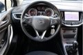 Opel Astra - 150pk Turbo Online Edition (NAV./1ste eig./PDC/Airco) - 1 - Thumbnail