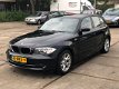 BMW 1-serie - 118i Business Line 5-DEURS -- AIRCO -- STUURBEDIENING - 1 - Thumbnail