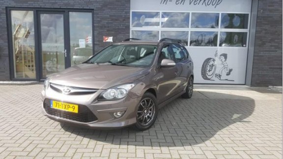 Hyundai i30 CW - 1.6i i-Motion Airco, NAV, Trekhaak - 1