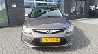 Hyundai i30 CW - 1.6i i-Motion Airco, NAV, Trekhaak - 1 - Thumbnail