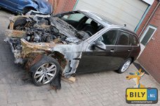 In onderdelen BMW F11 520dX '14 BILY  brandschade