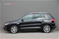 Volkswagen Tiguan - 1.4 TSI BMT Cup - 122 pk *Panorama / Xenon / Navi / Park Assist - 1 - Thumbnail