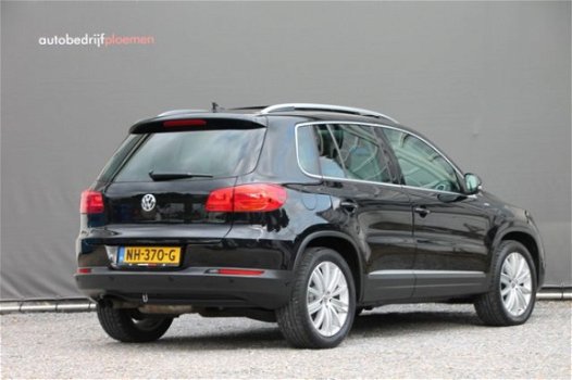 Volkswagen Tiguan - 1.4 TSI BMT Cup - 122 pk *Panorama / Xenon / Navi / Park Assist - 1