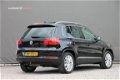 Volkswagen Tiguan - 1.4 TSI BMT Cup - 122 pk *Panorama / Xenon / Navi / Park Assist - 1 - Thumbnail