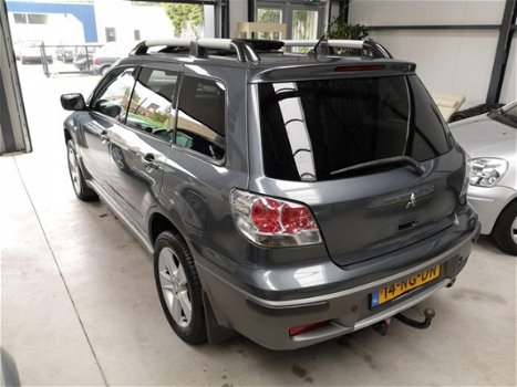 Mitsubishi Outlander Sport - 2.0 4WD Warrior - Leer, Pano, Clima, LM, SW, Trekhaak - 1