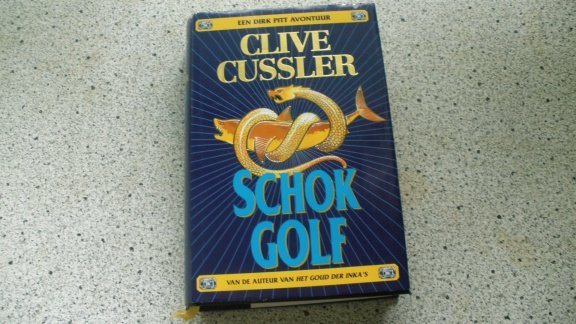 Clive Cussler.....Schokgolf - nr. 1