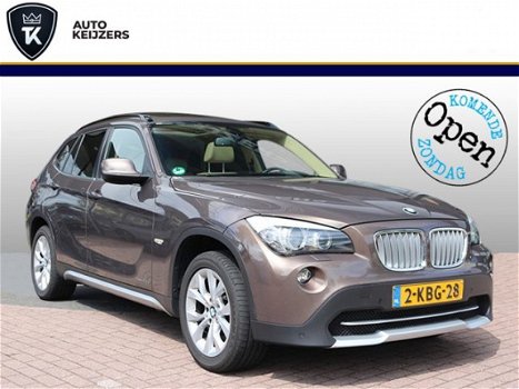 BMW X1 - 2.3D XDRIVE BUSINESS Panoramadak HarmanKardon Leer Navi Stoelverw. FULL 204PK - 1