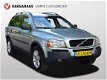 Volvo XC90 - 2.4 D5 7 persoons trekhaak open dak, afgeleverd met groot onderh. incl nwe distributie - 1 - Thumbnail