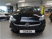 Opel Corsa - 1.0 Turbo 120 Jaar Edition - AIRCO - NAVI - CAMERA - STOEL + STUUR + VOORRAAMVERWARMING - 1 - Thumbnail