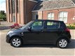 Suzuki Swift - 1.3 Exclusive 5 DEURS LEER/ AIRCO - 1 - Thumbnail